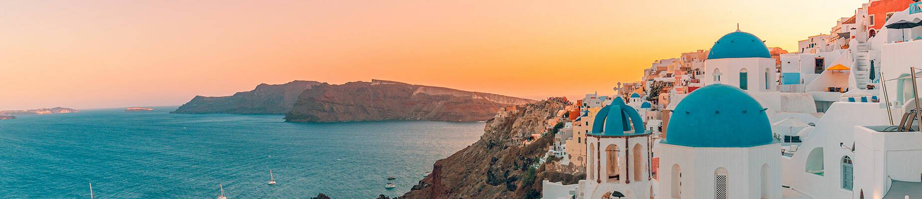 A panoramic view of Oia at sunset