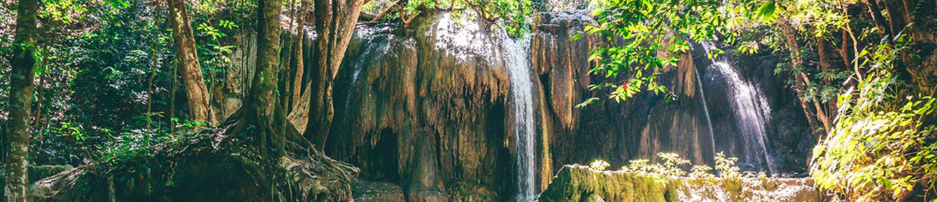 Deep forest waterfall on Moyo Island
