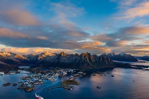 The sun rising over Svolvær