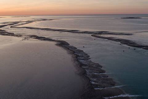 An aerial view over Montgomery Reef