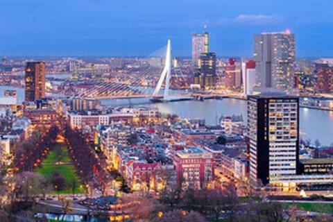 An aerial view of Rotterdam at dusk