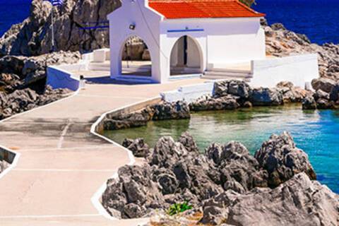 A church on the waters edge in Chios