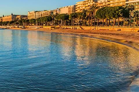 A panoramic view of Cannes at sunset