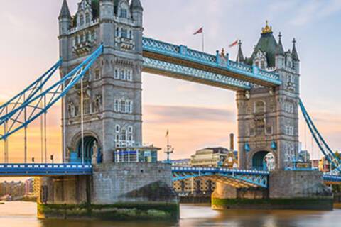 A panoramic view of Tower Bridge at sunrise