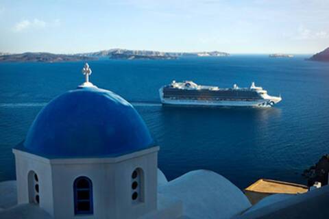 Emerald Princess sailing past Santorini