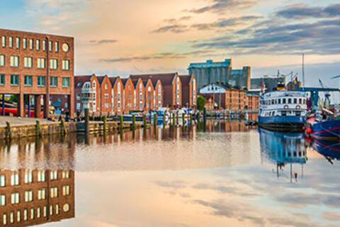 Kiel's cityscape reflected in water