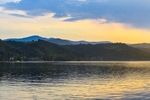 A panoramic view of Donji Milanovac at sunset