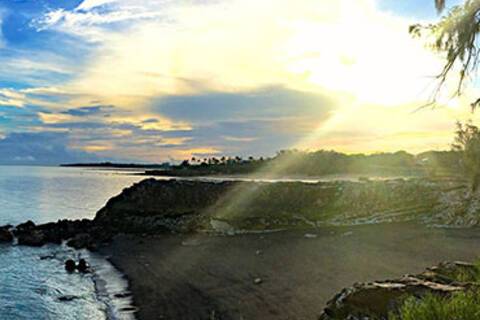 A panoramic view of sunrise at Nightcliff in Darwin