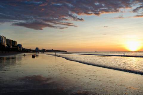 Beautiful colorful sunset at the beach in Manta, Ecuador